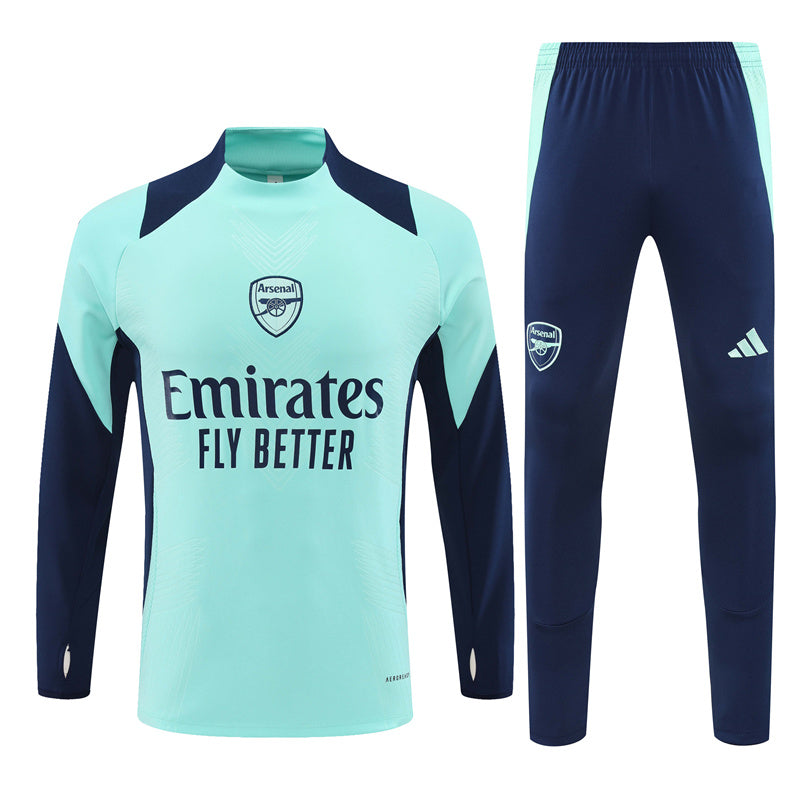 Arsenal Long Sleeve 1/4 Zipped Tracksuit Cyan/Navy 2024-25